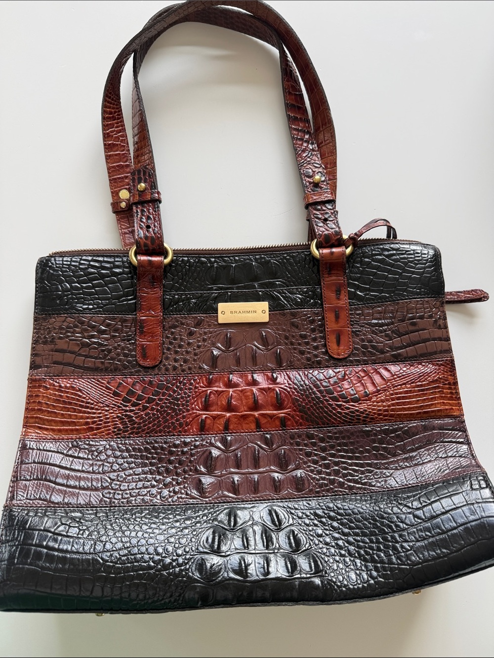 Brahmin satchel.  Croc embossed leather.  Black and browns.  11x13.